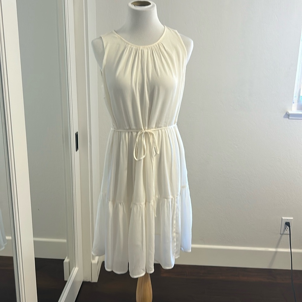 Darling mid-length cream color chiffon dress